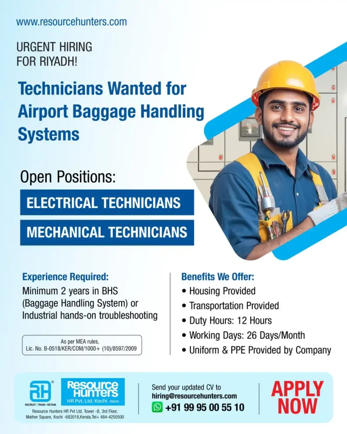 Technician working on an airport baggage handling system
