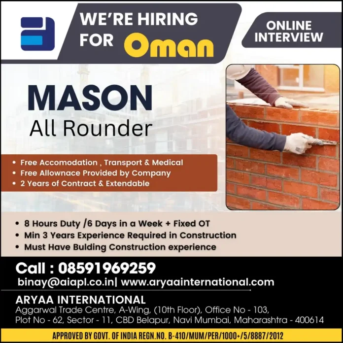 Mason working on a construction site in Oman