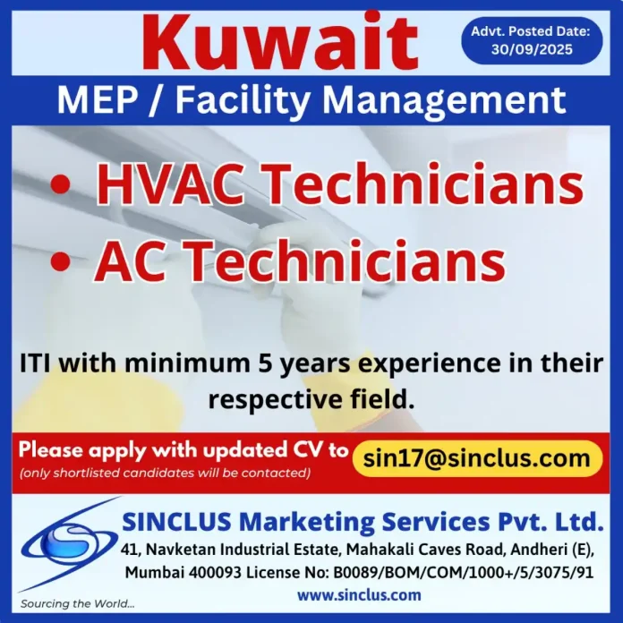 HVAC Technician performing maintenance on air conditioning system in Kuwait