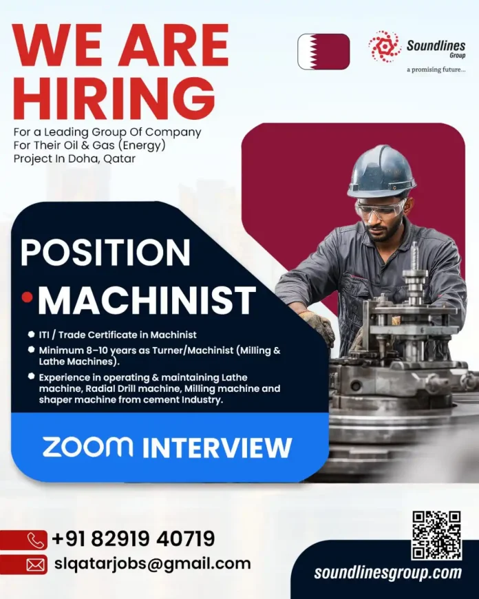 Machinist operating a lathe machine in an industrial setting
