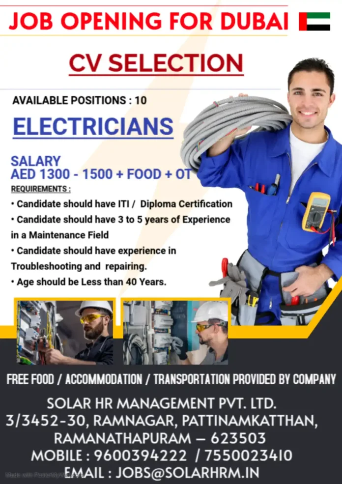 Electrician performing maintenance work in Dubai