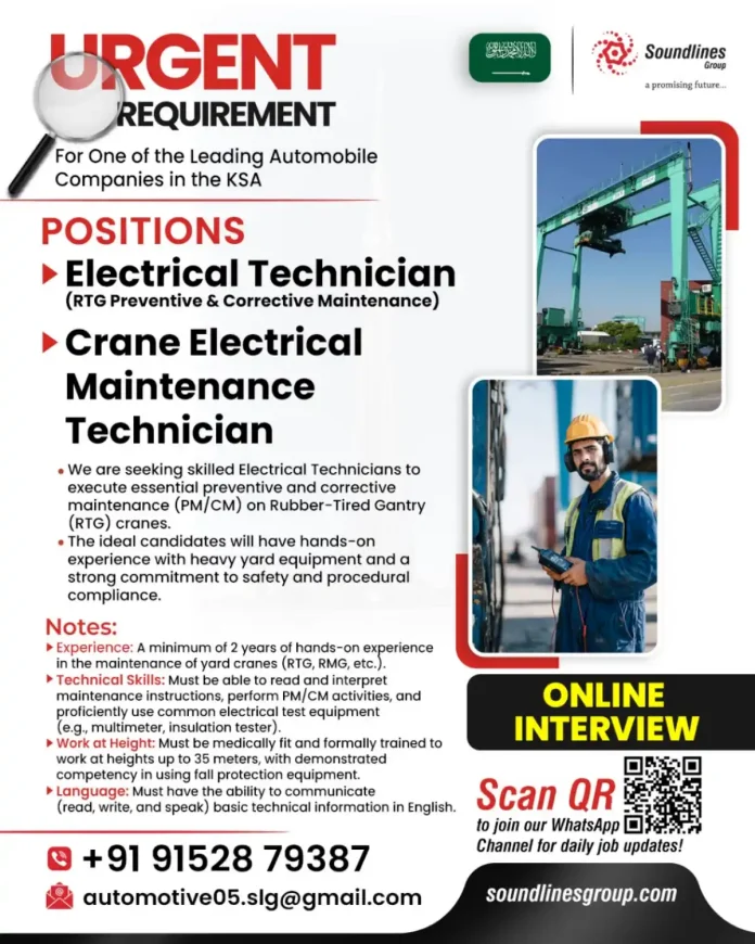 Electrical Technician performing maintenance on RTG crane in KSA