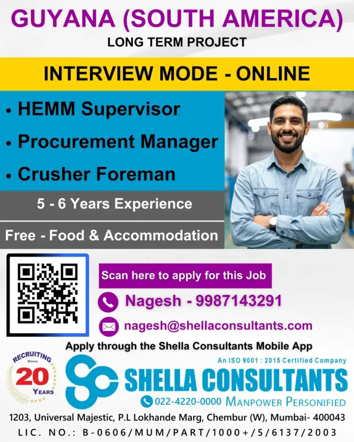 Mining industry professionals working on heavy machinery in Guyana, South America