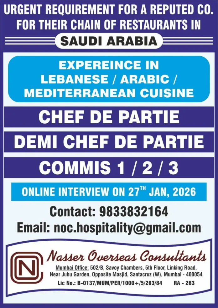 Chef preparing authentic Lebanese cuisine in a professional restaurant kitchen