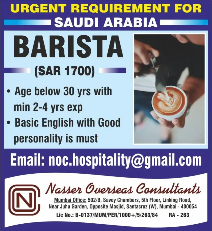 Professional Barista preparing coffee in a modern cafe setting