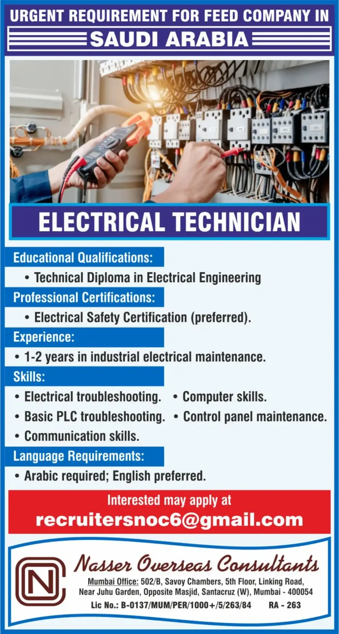 Electrical technician performing maintenance in a feed processing plant in Saudi Arabia