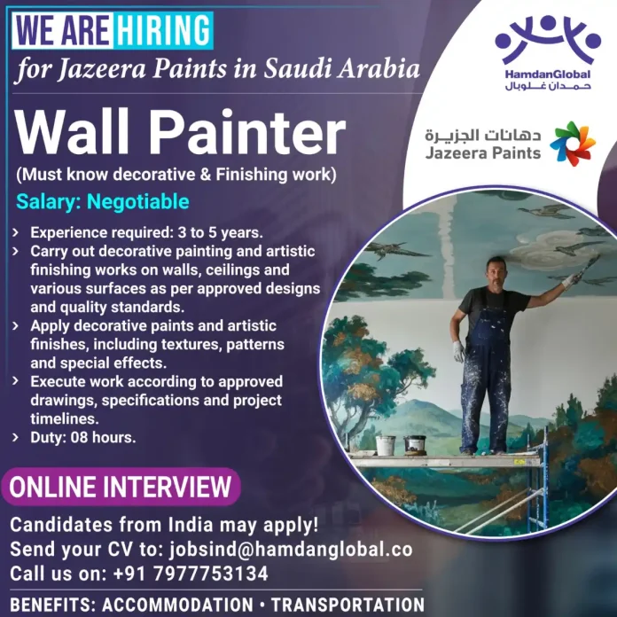 Wall Painter applying decorative finish at Jazeera Paints construction site in Saudi Arabia