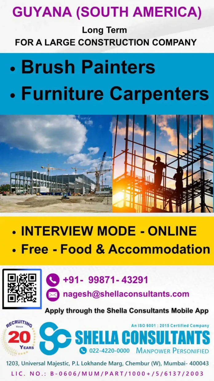 Construction workers painting and carpentry in Guyana