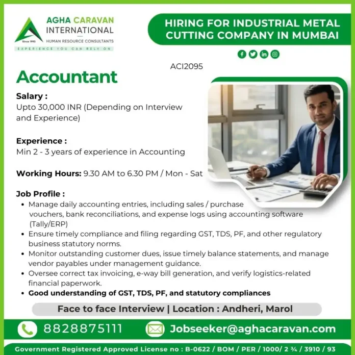 Accountant working on computer with Tally software and financial documents