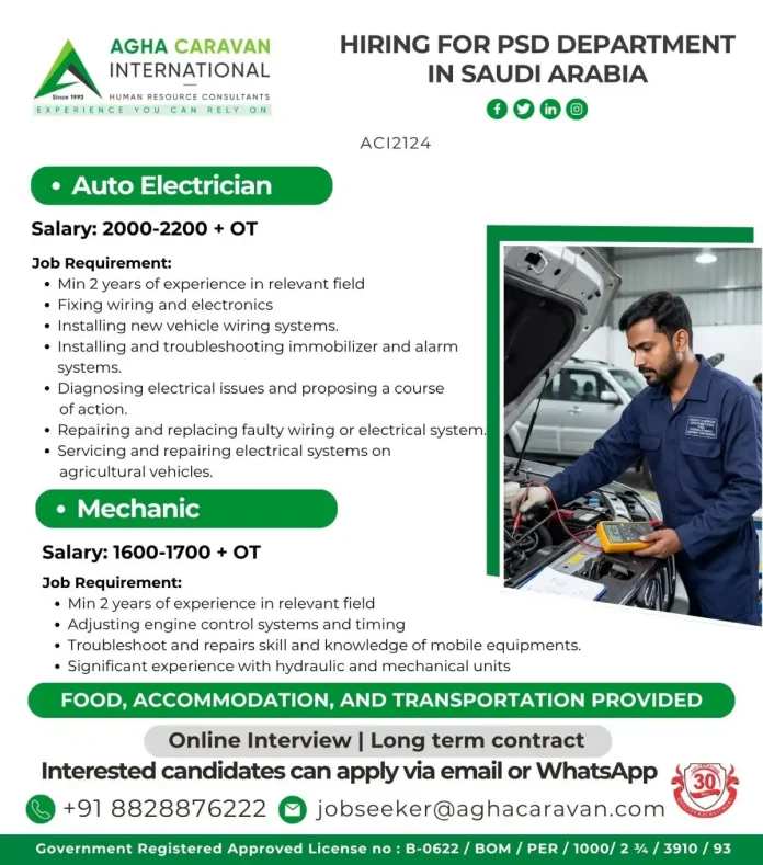 Auto Electrician working on vehicle electrical system in Saudi Arabia