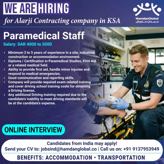 Paramedical staff with medical equipment in industrial setting