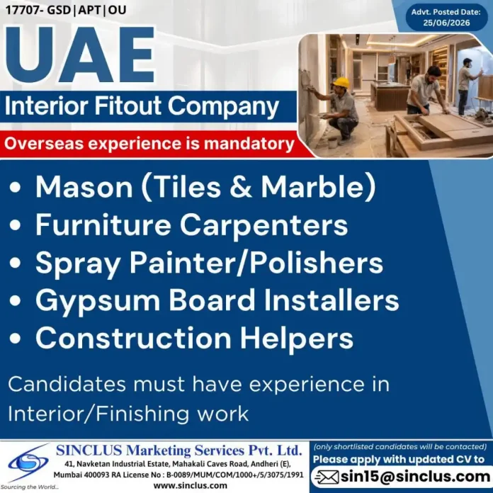 Interior fitout construction workers installing gypsum board and tiles in UAE