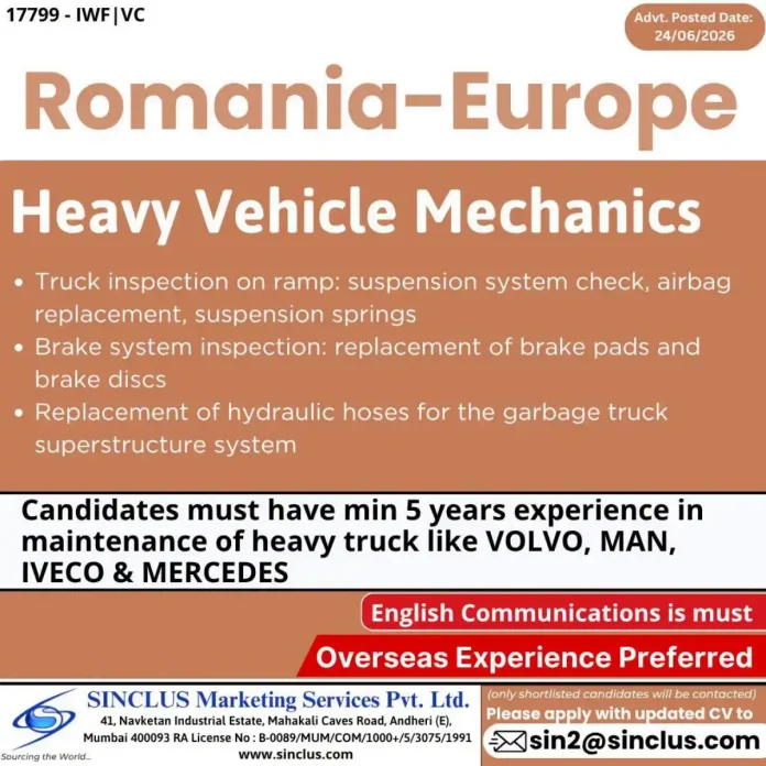 Heavy Vehicle Mechanic inspecting truck suspension in Romania