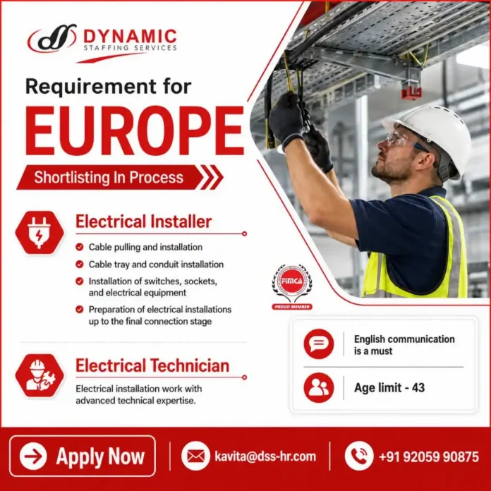 Electrical installer working on cable tray installation in Europe