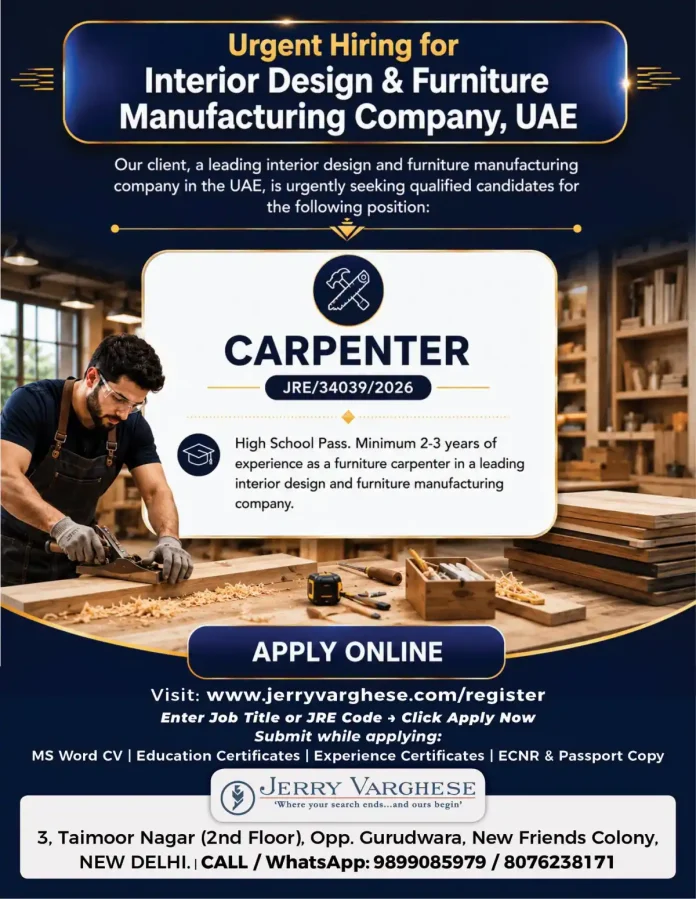 Carpenter working with wood in a furniture factory
