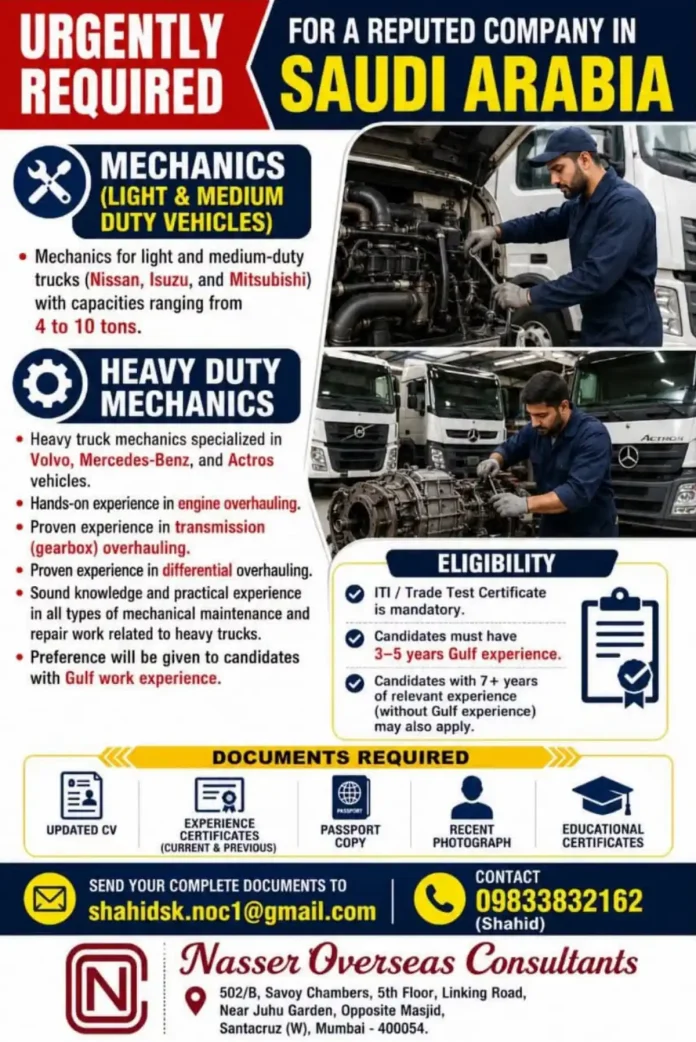 Mechanic working on heavy truck engine overhaul in Saudi Arabia