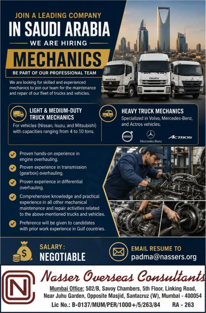 Truck mechanic working on heavy vehicle in Saudi Arabia